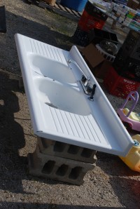 If I said this garage sale had everything but the kitchen sink, I'd be lying...