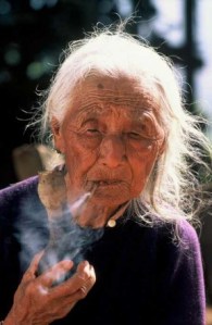 Mrs. Kurniawan has been reduced to smoking old stogies she has found.  Fat, but not too big around.