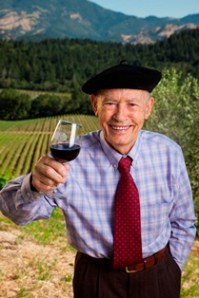 Mike Grgich holding a glass of something you can't pronounce.